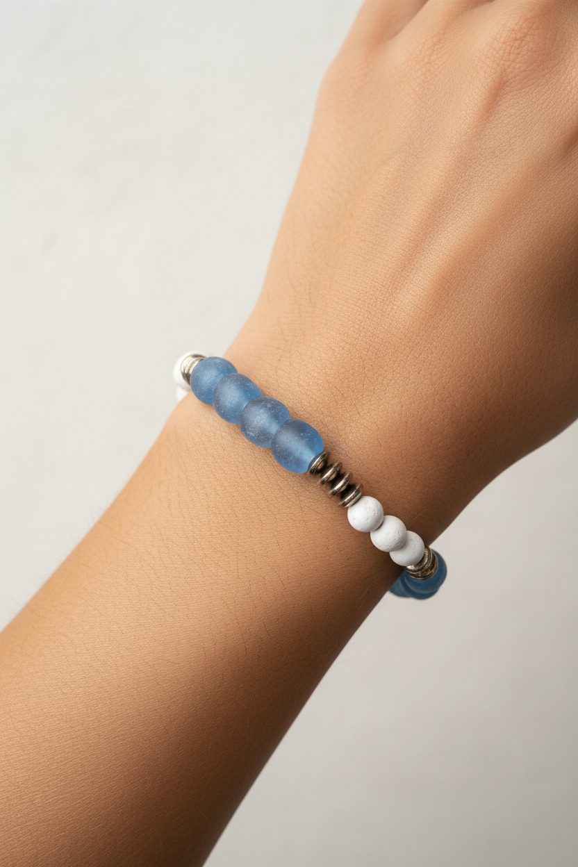 Bracelet with blue and white beads on a model