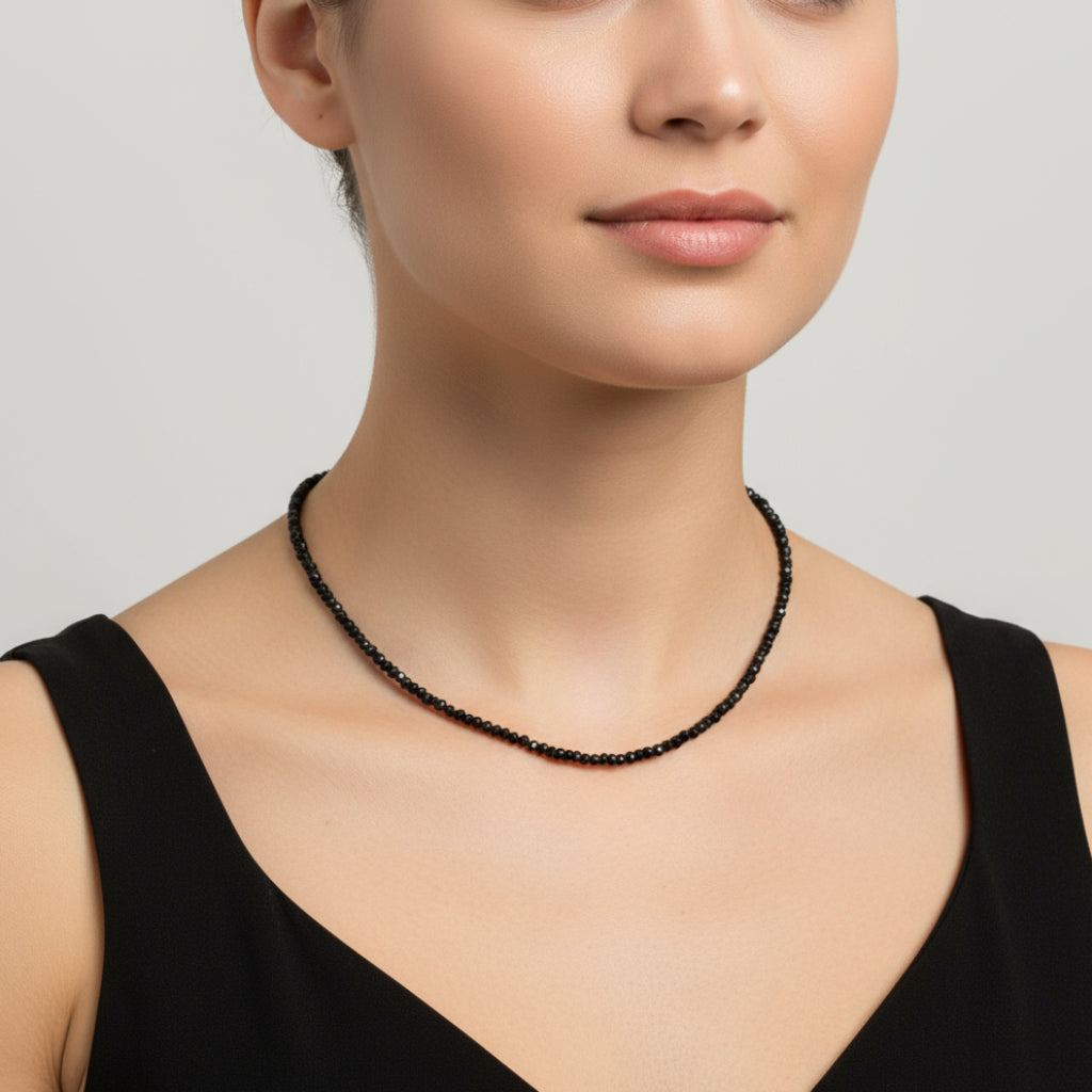 Willow & Fern Black Spinel Gemstone Necklace on a model wearing a simple black tank top