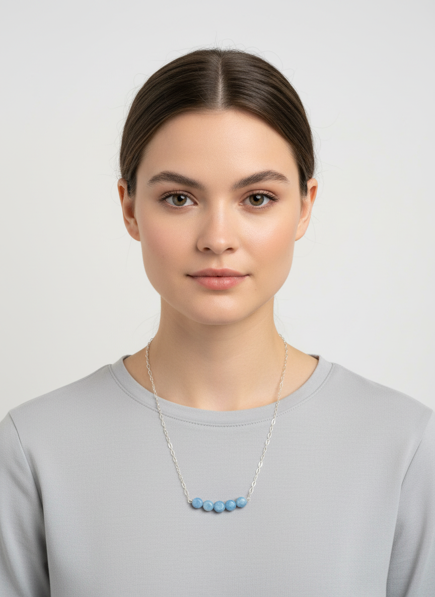 blue beaded necklace on a model