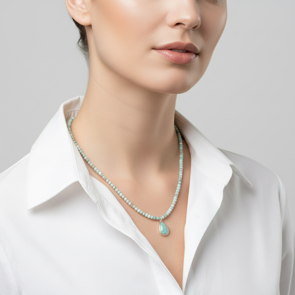 Necklace with a pendant on a mannequin bust in a home setting