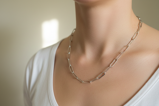 Silver paperclip chain necklace on a model 