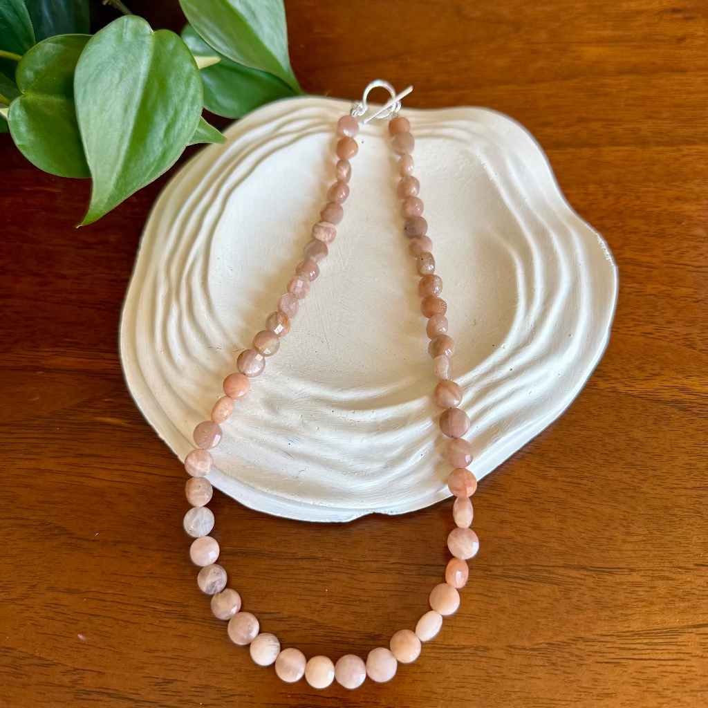 necklace on ring dish