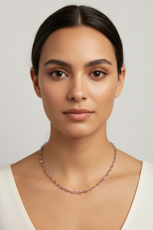 Purple and gold cable chain on a model