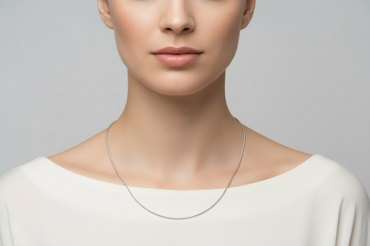 Snake chain necklace on a model